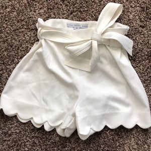 High waisted white scalloped shorts